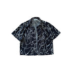 Black shirt with white abstract patterns on a white background