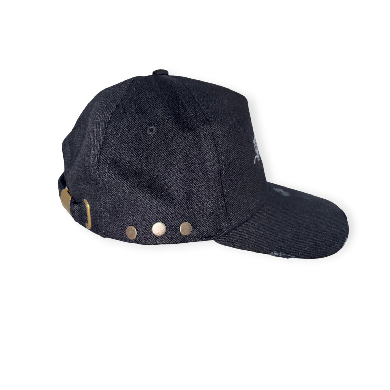 Black baseball cap with gold and silver buttons on a white background