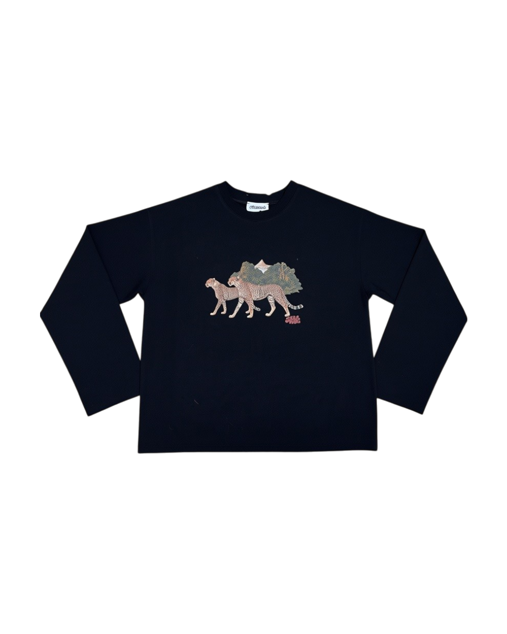 A navy blue long-sleeve crewneck sweatshirt featuring a graphic print of a walking dog layered with a landscape of mountains and trees in muted earth tones.