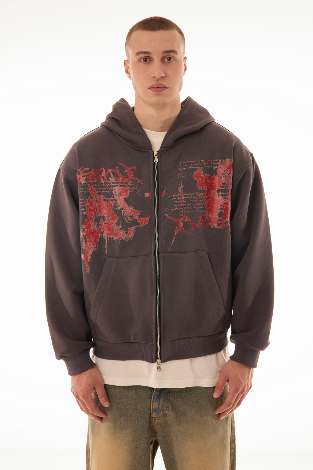 Model wearing Relic Grey zip up hoodie with red graphic print on front, premium 500 GSM cotton, oversized fit — streetwear zip hoodie