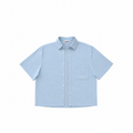 Light blue short-sleeve shirt with a brand logo on a white background