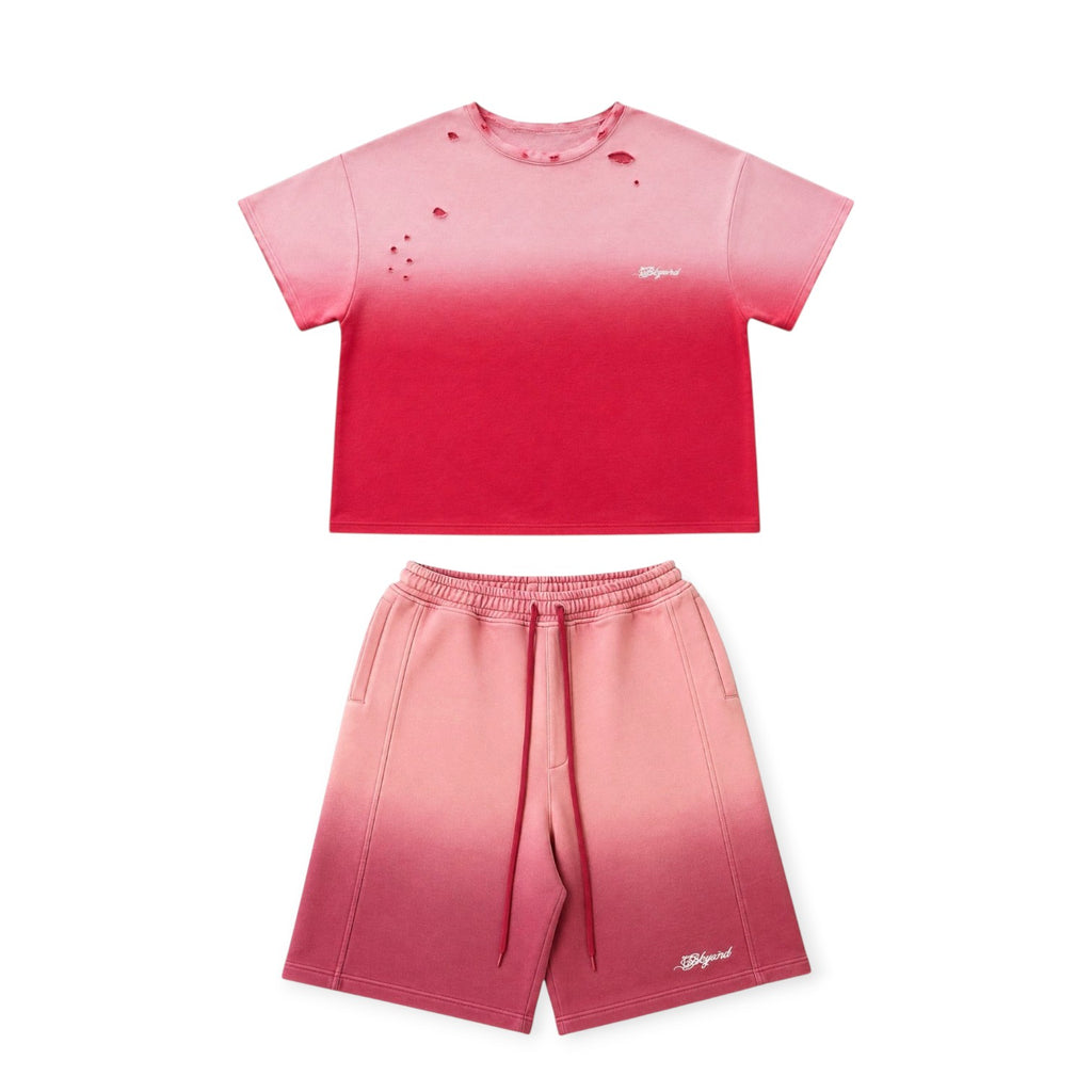 Pink gradient t-shirt and shorts set on a white background