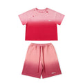 Pink gradient t-shirt and shorts set on a white background