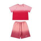 Pink gradient t-shirt and shorts set on a white background