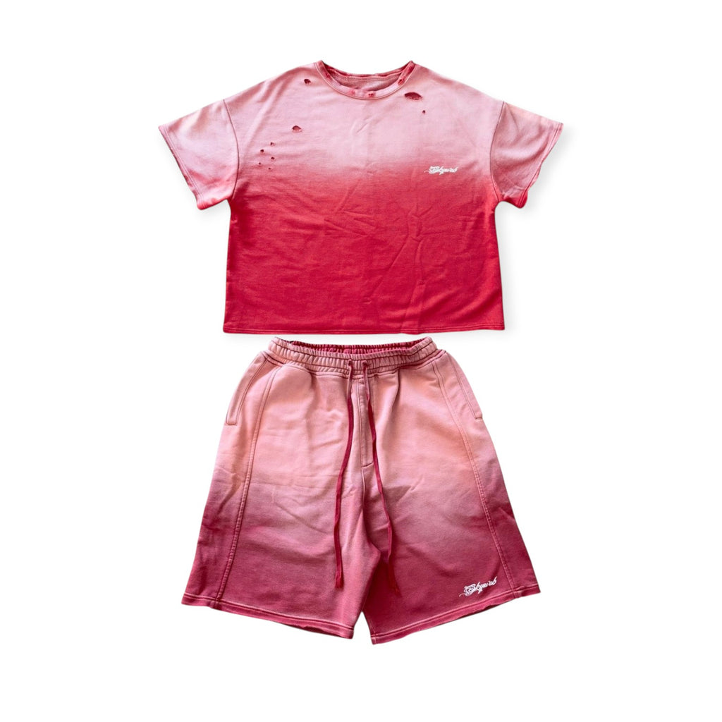 Pink t-shirt and shorts set on a white background