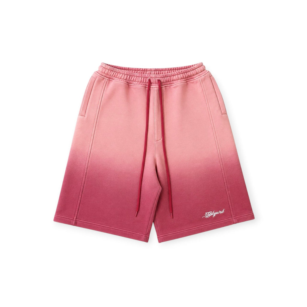 Pink shorts with a brand logo on a white background