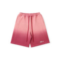 Pink shorts with a brand logo on a white background