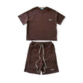 Brown t-shirt and shorts set on a white background