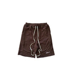Brown shorts with white drawstring on a white background