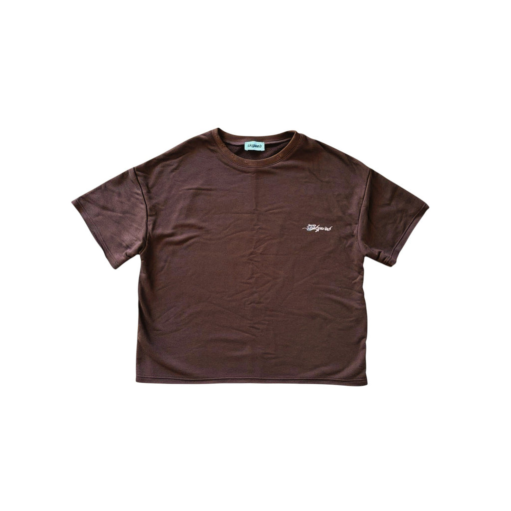 Brown t-shirt with a small logo on a white background