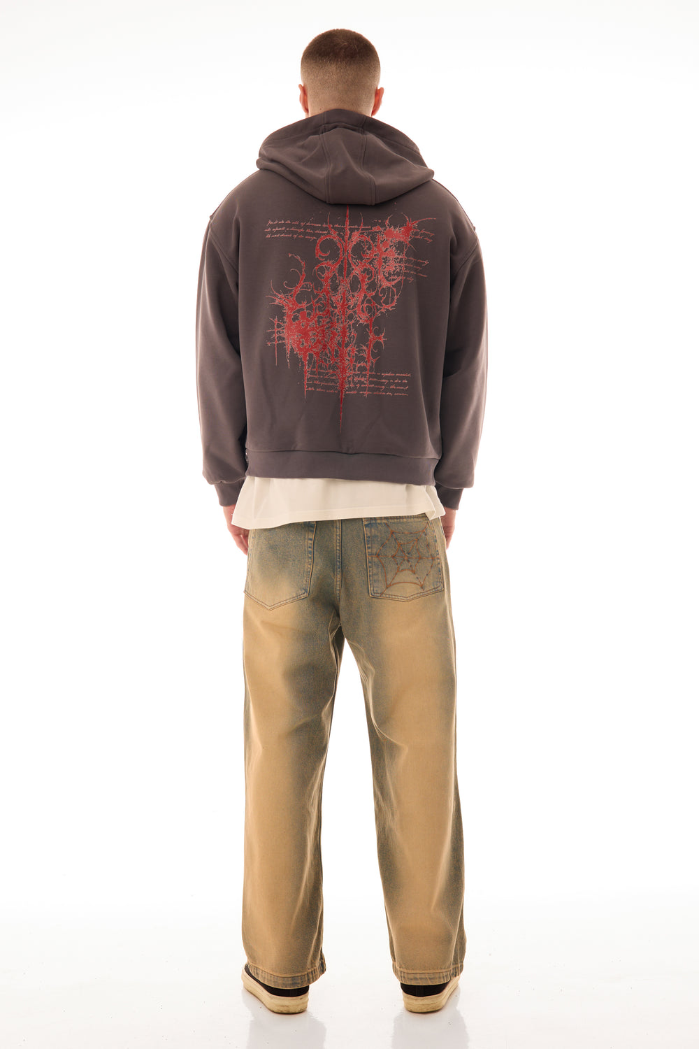 Blugi wide-leg albaștri cu efect stonewash și supravopsire, văzuți din spate, purtați de model masculin, fotografie full-body pe fundal alb.