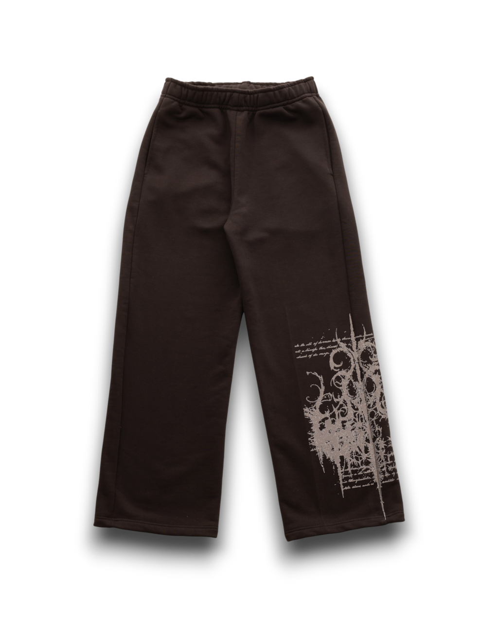 Dark brown wide-leg sweatpants with a white distressed graphic print on the lower right leg, displayed on a clean white background.
