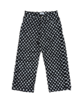 SKYWEB baggy jeans in black and white checkerboard denim with a textured cut and frayed surface and raw hem.